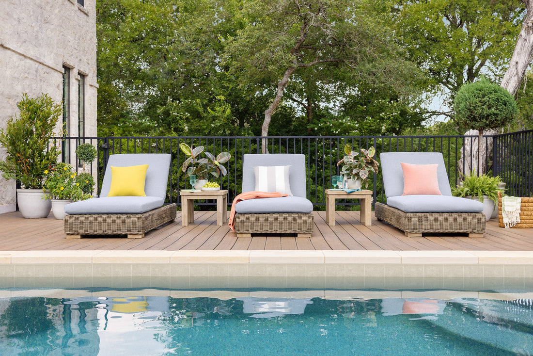 Three Ludlow Chaise Lounges in Glacier on a deck by the pool